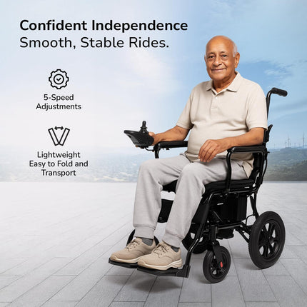 Elderly user with EcoMove electric wheelchair outdoors


